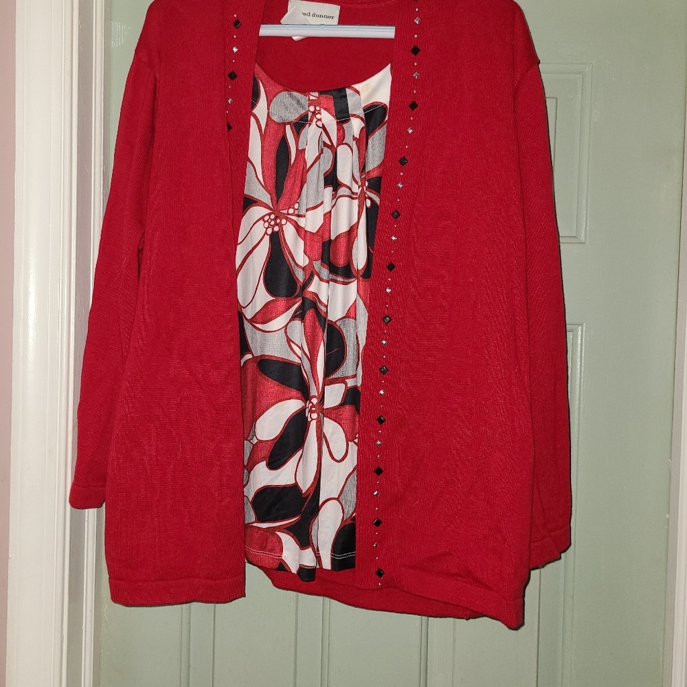 2 in 1 shirt with sweater attached.